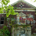 brick building in Staten Island, covered in graffiti