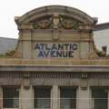 stone building with Atlantic Avenue sign in Brooklyn, New York